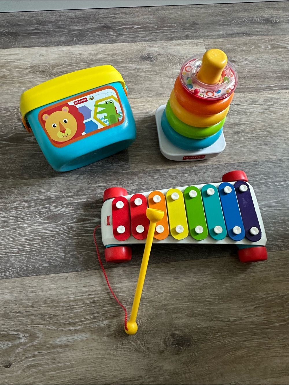 Fisher-Price Classic Infant Trio, Toy Set of 3: Stacking, Sorting & Musical Play